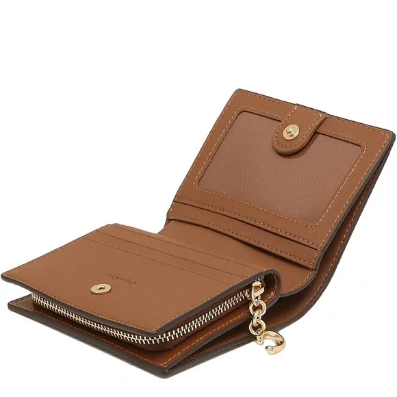 Coach Snap Wallet With Horse And Carriage Dot Print.
L: 4.25" W:1" H:3.5" - Picture 4 of 12